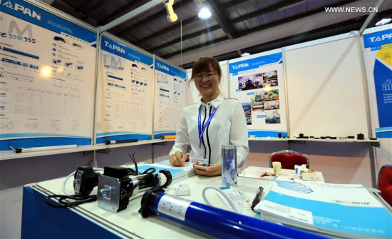 A woman works at a stall during the 14th China Expo (Jordan) in Amman, Jordan, on Sept. 6, 2017. The expo kicked off here on Wednesday, attracting 208 exhibitors from China. (Xinhua/Mohammad Abu Ghosh) A woman works at a stall during the 14th China Expo (Jordan) in Amman, Jordan, on Sept. 6, 2017. The expo kicked off here on Wednesday, attracting 208 exhibitors from China. (Xinhua/Mohammad Abu Ghosh)