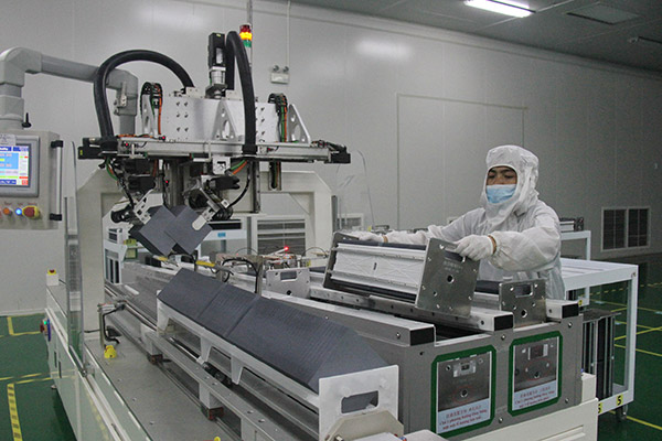 A staff member works at a China-invested photovoltaic technology company in Hanoi, Vietnam. (Photo/Xinhua) A staff member works at a China-invested photovoltaic technology company in Hanoi, Vietnam. (Photo/Xinhua)