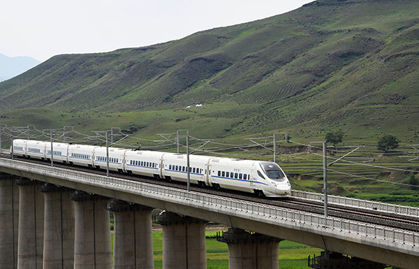 A high-speed train heads to Ulanqab from Hohhot in the Inner Mongolia autonomous region in August, marking the openning of the region's first high-speed railway. (Tang Zhe/For China Daily) A high-speed train heads to Ulanqab from Hohhot in the Inner Mongolia autonomous region in August, marking the openning of the region's first high-speed railway. (Tang Zhe/For China Daily)