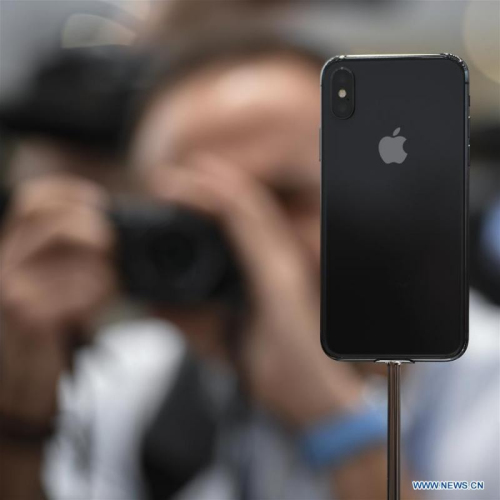 A man takes photos of new iPhone X displayed during a special event in Cupertino, California, the United States on Sept. 12, 2017. Apple Inc. released a series of new products and services in Cupertino on Tuesday. (Photo/Xinhua) A man takes photos of new iPhone X displayed during a special event in Cupertino, California, the United States on Sept. 12, 2017. Apple Inc. released a series of new products and services in Cupertino on Tuesday. (Photo/Xinhua)