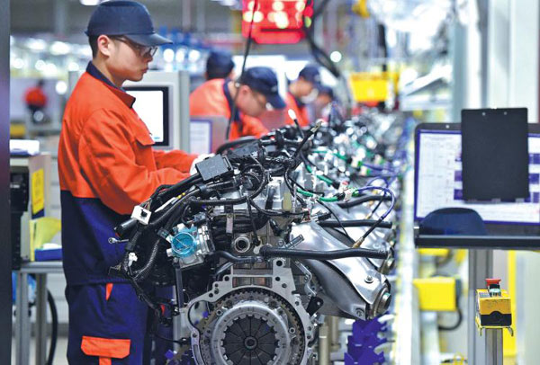 Workers assemble auto parts destined for Geely models at a production line of an engine company in Zhejiang province. (Photo by Lyv Bin/For China Daily) Workers assemble auto parts destined for Geely models at a production line of an engine company in Zhejiang province. (Photo by Lyv Bin/For China Daily)