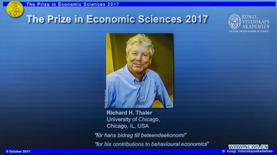 Photo of Richard H. Thaler is displayed on the screen during the press conference to announce the winner of the 2017 Nobel Prize in Economics in Stockholm, Sweden, on Oct. 9, 2017. (Xinhua/Shi Tiansheng) Photo of Richard H. Thaler is displayed on the screen during the press conference to announce the winner of the 2017 Nobel Prize in Economics in Stockholm, Sweden, on Oct. 9, 2017. (Xinhua/Shi Tiansheng)