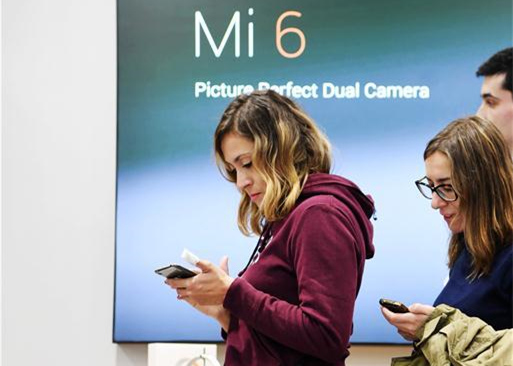 Customers queue to buy Xiaomi products at a store in Madrid, capital of Spain, on Nov. 11, 2017. Xiaomi, one of the leading high-tech enterprises of China, opened on Saturday morning its two stores via its authorized re-sellers in Madrid. (Xinhua/Guo Qiuda) Customers queue to buy Xiaomi products at a store in Madrid, capital of Spain, on Nov. 11, 2017. Xiaomi, one of the leading high-tech enterprises of China, opened on Saturday morning its two stores via its authorized re-sellers in Madrid. (Xinhua/Guo Qiuda)