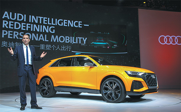 Audi China chief Joachim Wedler presents the Q8 concept at a news conference ahead of the Guangzhou auto show.(Photo provided to China Daily) Audi China chief Joachim Wedler presents the Q8 concept at a news conference ahead of the Guangzhou auto show.(Photo provided to China Daily)