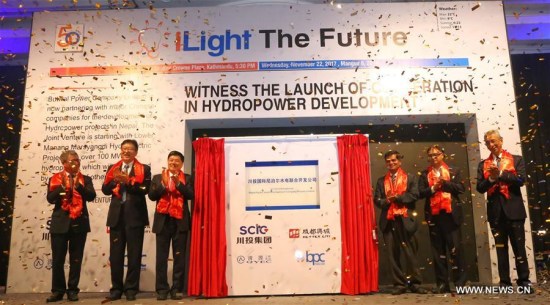 Liu Guoqiang (3rd L), chairman of China's Sichuan Provincial Investment Group Co. Ltd (SPIG) board, Nepal's Butwal Power Company (BPC) Chairman Padma Jyoti (1st R) and other delegates launch a joint venture between Chinese companies and Butwal Power Company (BPC) in Kathmandu, capital of Nepal, on Nov. 22, 2017. (Xinhua/Sunil Sharma) Liu Guoqiang (3rd L), chairman of China's Sichuan Provincial Investment Group Co. Ltd (SPIG) board, Nepal's Butwal Power Company (BPC) Chairman Padma Jyoti (1st R) and other delegates launch a joint venture between Chinese companies and Butwal Power Company (BPC) in Kathmandu, capital of Nepal, on Nov. 22, 2017. (Xinhua/Sunil Sharma)