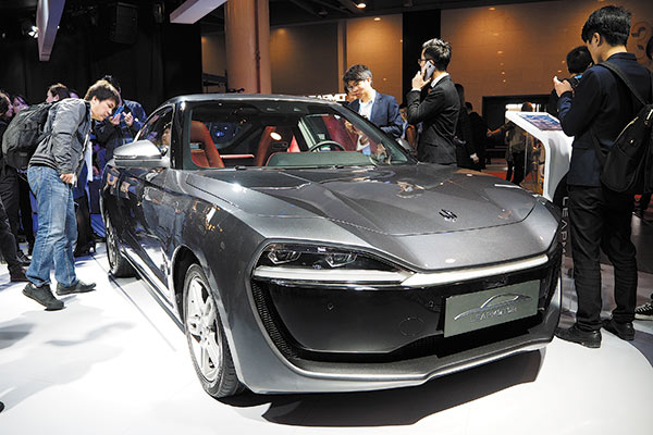 Leap Motor, founded in December 2015, unveils its sub-compact full electric coupe on Nov 10 in Hangzhou, Zhejiang province.(Photo by Hao Yan/China Daily) Leap Motor, founded in December 2015, unveils its sub-compact full electric coupe on Nov 10 in Hangzhou, Zhejiang province.(Photo by Hao Yan/China Daily)