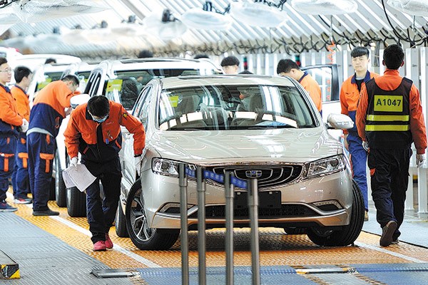 Workers check cars at a Geely production line in Ningbo, Zhejiang province.(Photo by Shi Yu/for China Daily) Workers check cars at a Geely production line in Ningbo, Zhejiang province.(Photo by Shi Yu/for China Daily)
