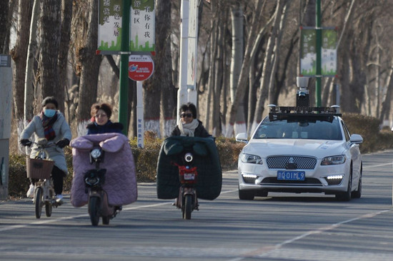 A self-driving vehicle produced by Baidu Inc undergoes a road test in Xiongan New Area, Hebei province, on Dec 20, 2017. (Provided to China Daily) A self-driving vehicle produced by Baidu Inc undergoes a road test in Xiongan New Area, Hebei province, on Dec 20, 2017. (Provided to China Daily)