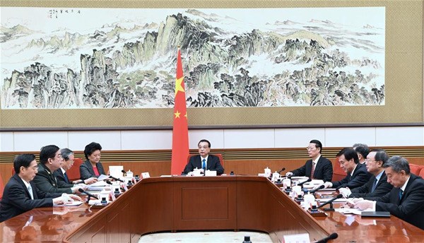 Chinese Premier Li Keqiang presides over the 8th plenary meeting of the State Council, which discussed a draft version of the government work report, in Beijing, capital of China, Jan. 22, 2018. (Xinhua/Rao Aimin) Chinese Premier Li Keqiang presides over the 8th plenary meeting of the State Council, which discussed a draft version of the government work report, in Beijing, capital of China, Jan. 22, 2018. (Xinhua/Rao Aimin)