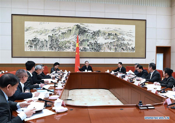Chinese Premier Li Keqiang presides over a meeting with economic experts and entrepreneurs to collect opinions on the annual government work report scheduled to be published in March, in Beijing, capital of China, Jan. 22, 2018. Chinese Vice Premier Zhang Gaoli and Wang Yang, a member of the Standing Committee of the Political Bureau of the Communist Party of China (CPC) Central Committee and vice premier, also attended the meeting. (Xinhua/Rao Aimin) Chinese Premier Li Keqiang presides over a meeting with economic experts and entrepreneurs to collect opinions on the annual government work report scheduled to be published in March, in Beijing, capital of China, Jan. 22, 2018. Chinese Vice Premier Zhang Gaoli and Wang Yang, a member of the Standing Committee of the Political Bureau of the Communist Party of China (CPC) Central Committee and vice premier, also attended the meeting. (Xinhua/Rao Aimin)