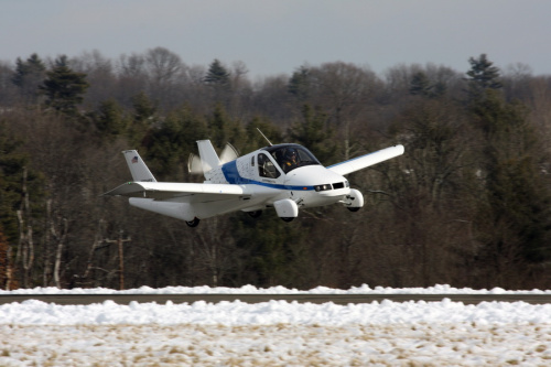 A flying car named the TF-X lands at Lawrence Municipal Airport, Massachusetts. (Photo/China Daily)