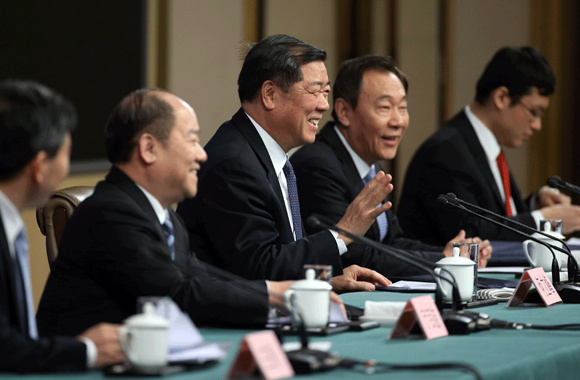 He Lifeng, minister of the National Development and Reform Commission, gestures to reporters on Tuesday. (Photo by Wang Zhuangfei/China Daily) He Lifeng, minister of the National Development and Reform Commission, gestures to reporters on Tuesday. (Photo by Wang Zhuangfei/China Daily)