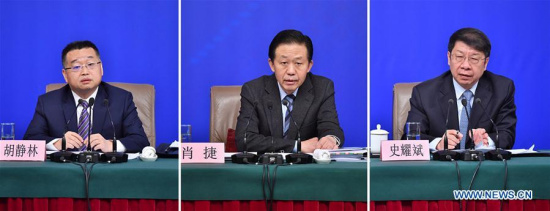 Combined photo shows Chinese Finance Minister Xiao Jie (C) and vice finance ministers Shi Yaobin (R) and Hu Jinglin anwsering questions at a press conference on reform of fiscal and taxation system and financial work during the first session of the 13th National People's Congress in Beijing, capital of China, March 7, 2018. (Xinhua/Li Xin) Combined photo shows Chinese Finance Minister Xiao Jie (C) and vice finance ministers Shi Yaobin (R) and Hu Jinglin anwsering questions at a press conference on reform of fiscal and taxation system and financial work during the first session of the 13th National People's Congress in Beijing, capital of China, March 7, 2018. (Xinhua/Li Xin)