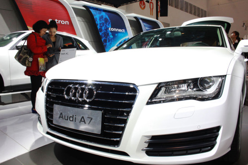 Visitors admire an Audi A7 produced by FAW-Volkswagen Group at an auto show in Haikou, Hainan Province. (Photo provided to China Daily) Visitors admire an Audi A7 produced by FAW-Volkswagen Group at an auto show in Haikou, Hainan Province. (Photo provided to China Daily)