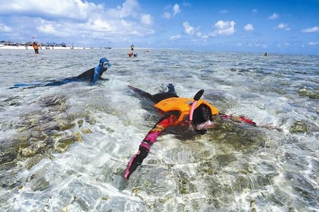 Sanya eyes global tourism role, mayor says