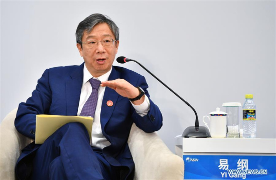 Yi Gang, governor of the People's Bank of China, speaks at the session of Monetary Policies: Back to Normal during the Boao Forum for Asia Annual Conference 2018 in Boao, south China's Hainan Province, April 11, 2018. (Xinhua/Guo Cheng)