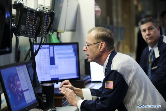 Traders work at the New York Stock Exchange in New York, the United States, on April 10, 2018.([Photo/Xinhua) Traders work at the New York Stock Exchange in New York, the United States, on April 10, 2018.([Photo/Xinhua)
