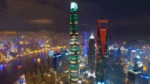 Shanghai points to successes in further opening