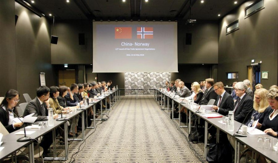 Photo taken on May 14, 2018 shows the view of a meeting during the 11th round of free trade agreement negotiations between China and Norway in Oslo, Norway. China and Norway on Wednesday completed their latest round of negotiations for a free trade agreement and positive progress has been made. (Xinhua/Liang Youchang) Photo taken on May 14, 2018 shows the view of a meeting during the 11th round of free trade agreement negotiations between China and Norway in Oslo, Norway. China and Norway on Wednesday completed their latest round of negotiations for a free trade agreement and positive progress has been made. (Xinhua/Liang Youchang)