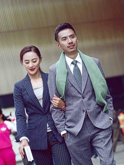 Kalsang Phuntsok and his wife Dawa Dolma in business suits.(Photo/www.ynet.com) Kalsang Phuntsok and his wife Dawa Dolma in business suits.(Photo/www.ynet.com)