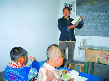 Gao Yanmin, abducted by two human traffickers in 1994, became an award-winning teacher in a remote village in Hebei province. (File photo) Gao Yanmin, abducted by two human traffickers in 1994, became an award-winning teacher in a remote village in Hebei province. (File photo)