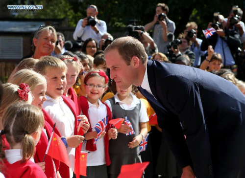 File photo taken on Sept 8, 2014 shows Prince William (R), Duke of Cambridge, speaking with school students as he arrives to formally inaugurate the Dickson Poon University of Oxford China Centre Building in Oxford, Britain. (Photo: Xinhua/Han Yan) File photo taken on Sept 8, 2014 shows Prince William (R), Duke of Cambridge, speaking with school students as he arrives to formally inaugurate the Dickson Poon University of Oxford China Centre Building in Oxford, Britain. (Photo: Xinhua/Han Yan)