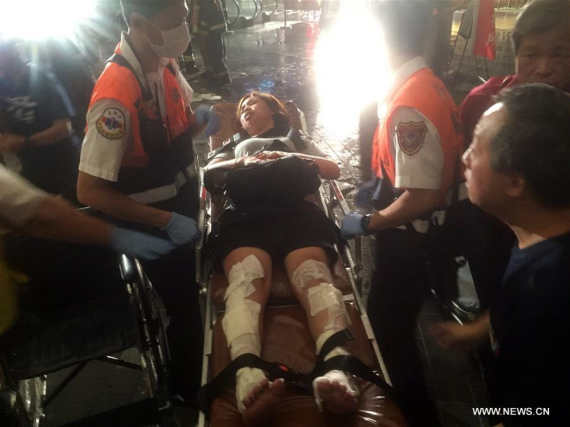 Rescuers transfer an injured person after an explosion of a commuter train in Taipei, southeast China's Taiwan, July 7, 2016. (Photo/Xinhua) Rescuers transfer an injured person after an explosion of a commuter train in Taipei, southeast China's Taiwan, July 7, 2016. (Photo/Xinhua)