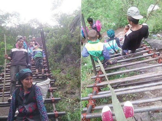 Steel-bar ladders are under construction on the cliff of Atuleer village in Liangshan Yi autonomous prefecture of Sichuan Province. (Photo/Beijing News) Steel-bar ladders are under construction on the cliff of Atuleer village in Liangshan Yi autonomous prefecture of Sichuan Province. (Photo/Beijing News)