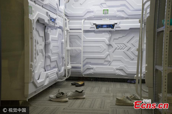 Shoes of users are seen near sleep capsules in the business incubator area of Haidian District, Beijing, July 9, 2017. (Photo/VCG) Shoes of users are seen near sleep capsules in the business incubator area of Haidian District, Beijing, July 9, 2017. (Photo/VCG)