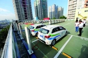 A new electric vehicle charging station was officially opened for use on the sixth floor of a parking garage at SOHO Modern City in Chaoyang District, BeijingAugust 8, 2017. (Photo/Beijing Morning Post)