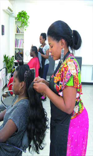 Natho Bamukanga at Majesty Hair Salon