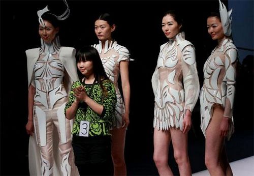 In the end, its Beijing-based Wang Zhixian who wins the gold award. Her productions blend traditional Chinese elements with modern designs.