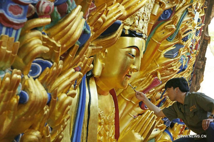 Restoration work of Guanyin sculpture enters final phase(1/4)