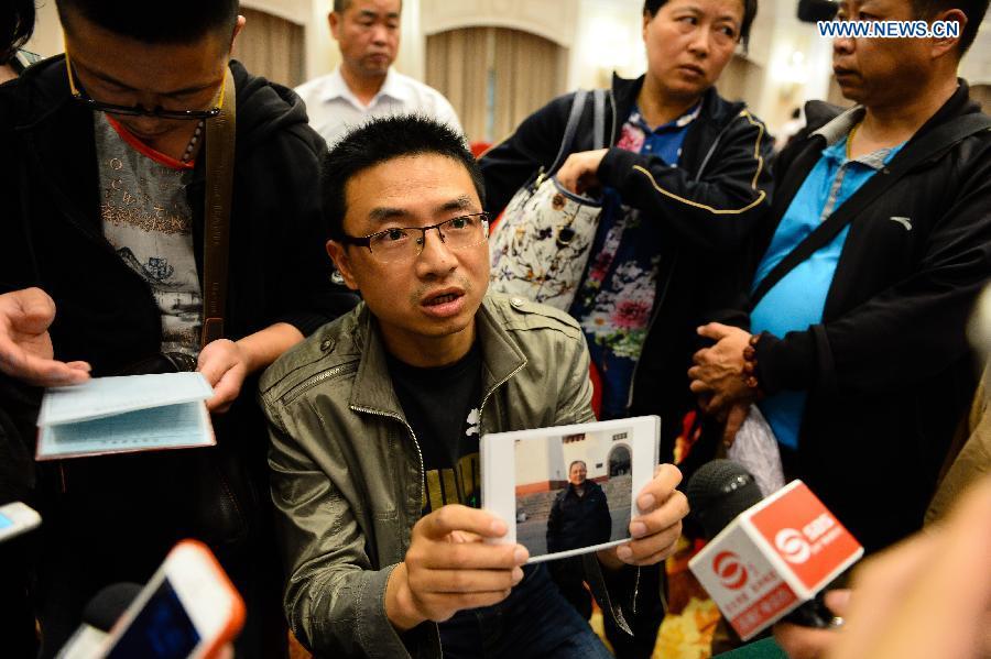 In pics: Relatives of passengers on board overturned ship (1/6)