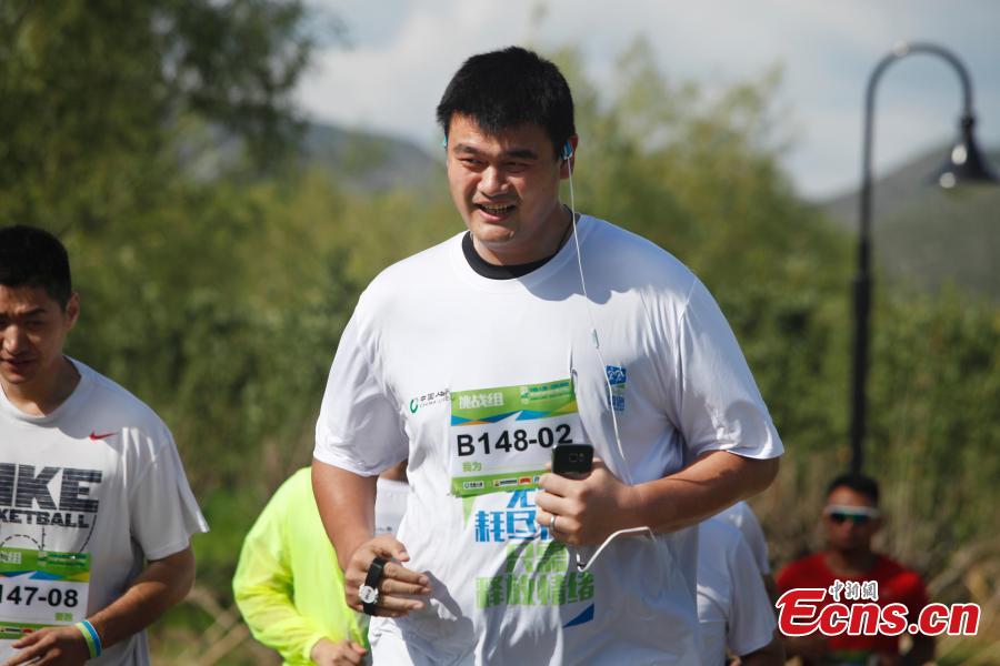 Yao Ming promotes city relay in Beijing(1/8)
