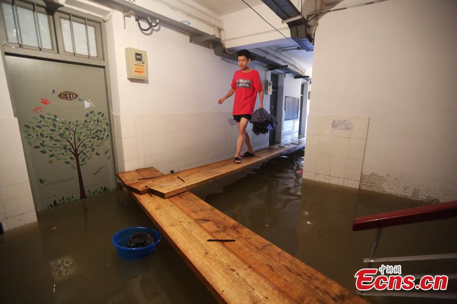 University dorm flooded during rainstorms(1/7)