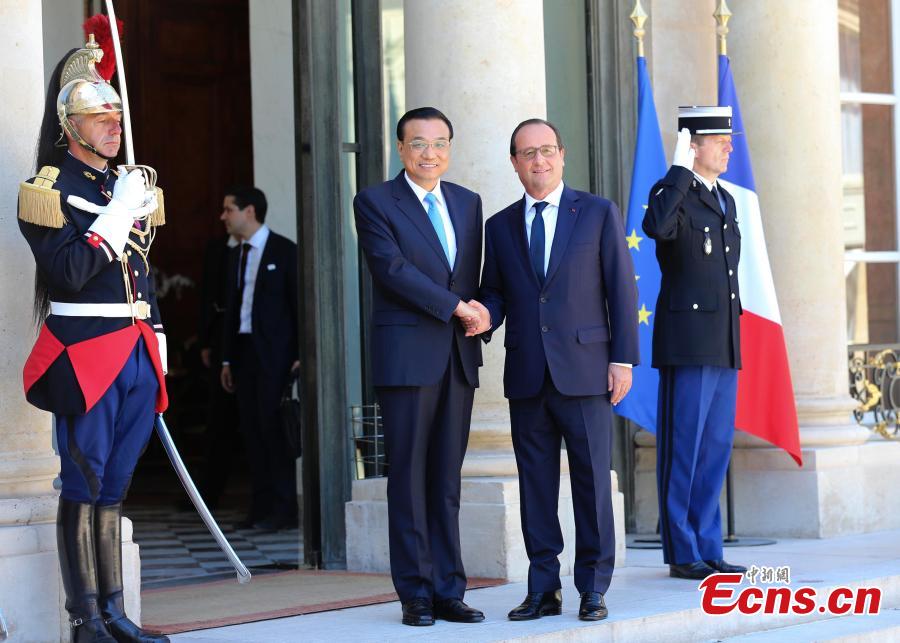 Premier Li meets French President Francois Hollande (1/2)