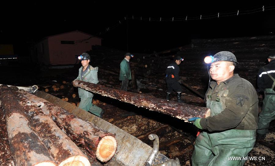 15 trapped in China coal mine flood(1/4)