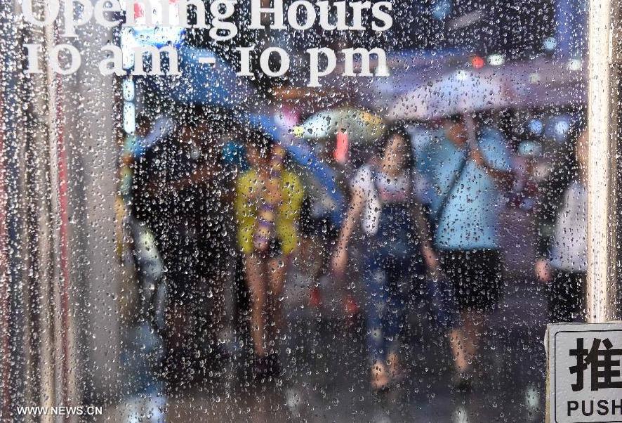 Rainstorm hits Beijing, China issues yellow alert(1/4)