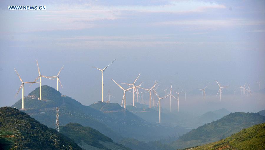 Photo taken on Agu. 9, 2015 shows the wind power generator group at Yueshan mountain of Lichuan City in Enshi Tujia Autonomous Prefecture, central China\'s Hubei Province. 203 wind power generators were built at the top of Yueshan mountain where the altitude is nearly 1,600 meters. (Photo: Xinhua/Yang Shunpi)