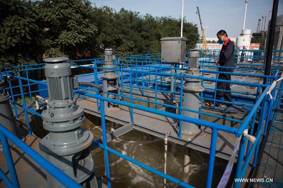 Cyanide treatment facility put into operation after blast in Tianjin(1/5)