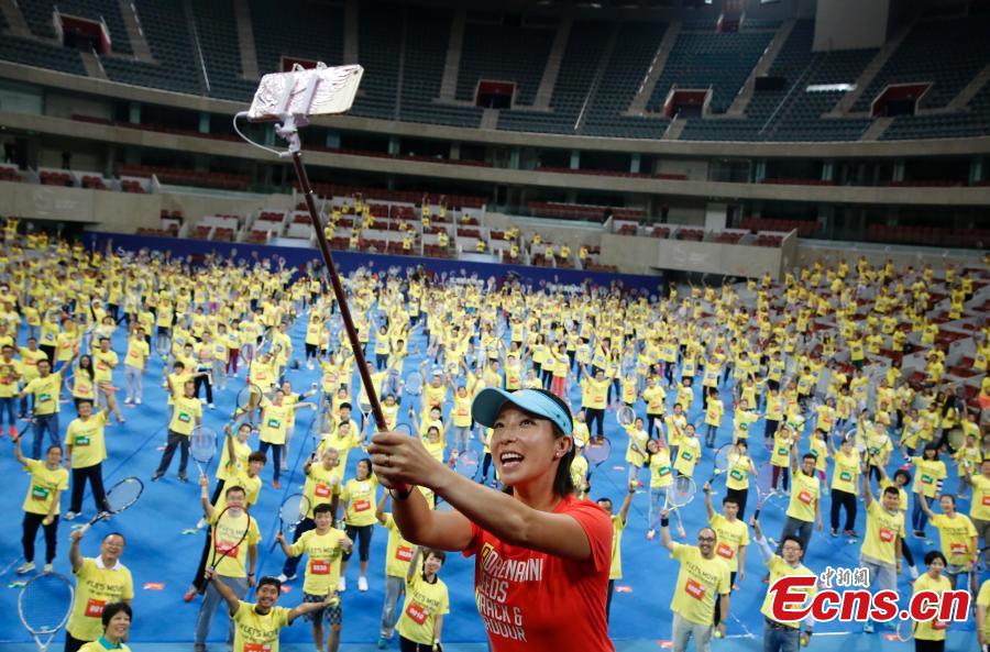 Zheng Jie leads tennis fans to create new Guinness Record(1/5)