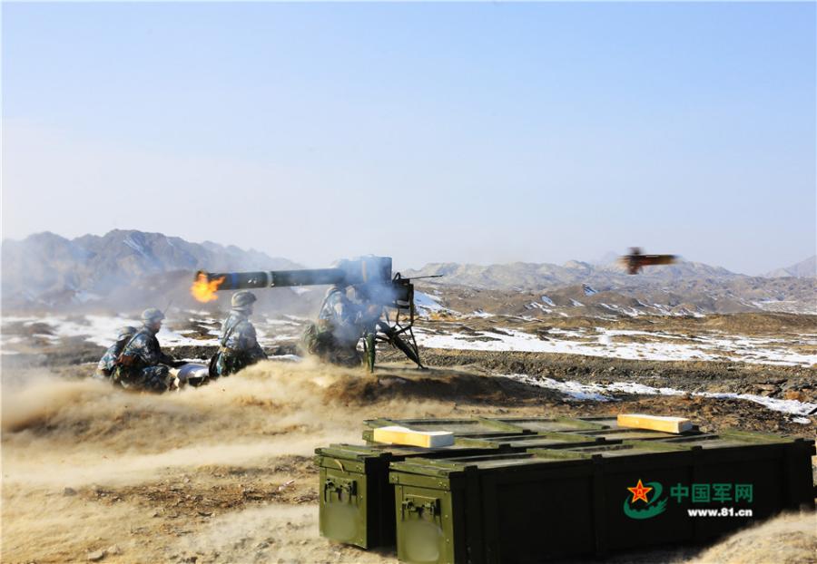 PLA conducts winter live-fire drill in NW China's Xinjiang (1/10)
