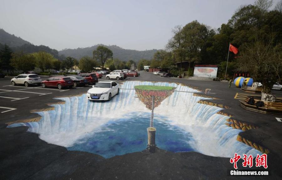 3D painting of waterfall debuts at parking lot (1/4)