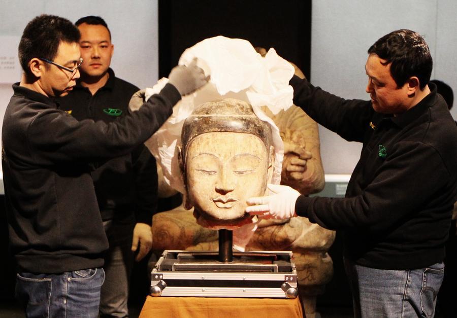 Stolen Buddha statue head arrives in Hebei museum(1/2)