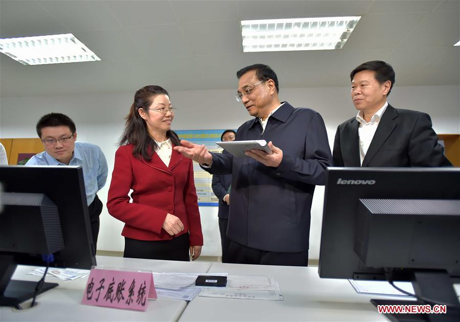 Li demands solid efforts to deliver tax reform(1/5)