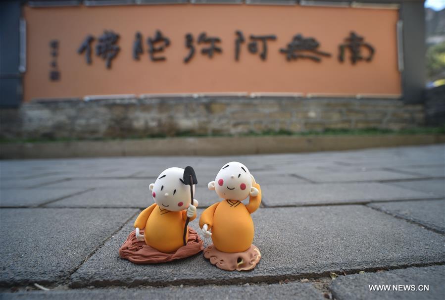Cartoon character Monk Xian'er of Longquan Monastery in Beijing(1/9)