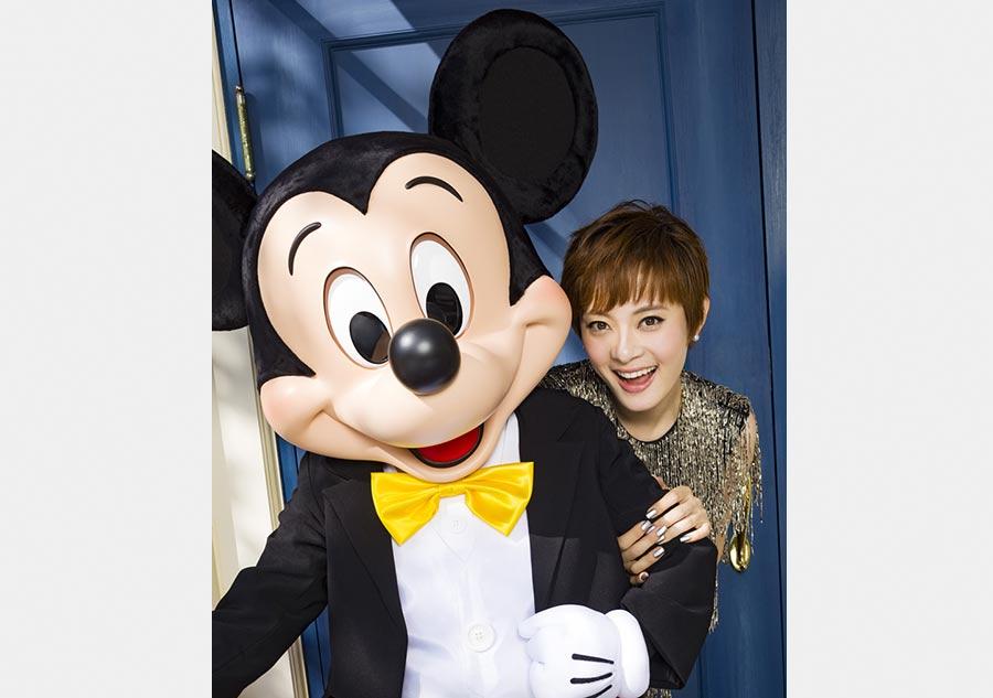 Ambassador for Disney Shanghai Sun Li poses in theme park(1/7)