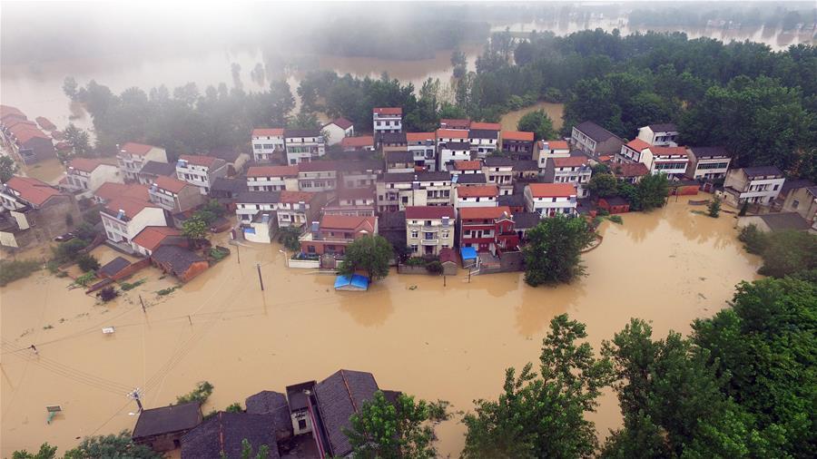 One dead,three missing after dike breach in central China(1/7)