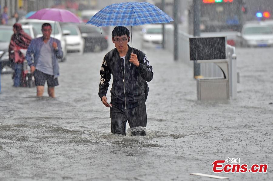 North China city Taiyuan hit by rain for 19 hours(1/7)